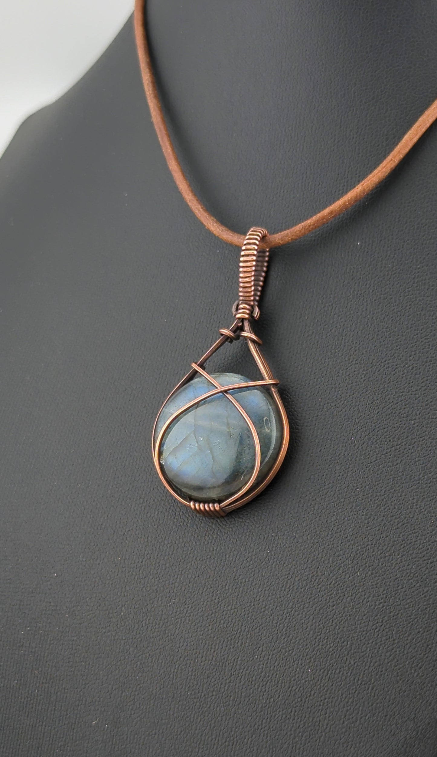 Labradorite Pendant, with blue flash, set in antiqued copper.