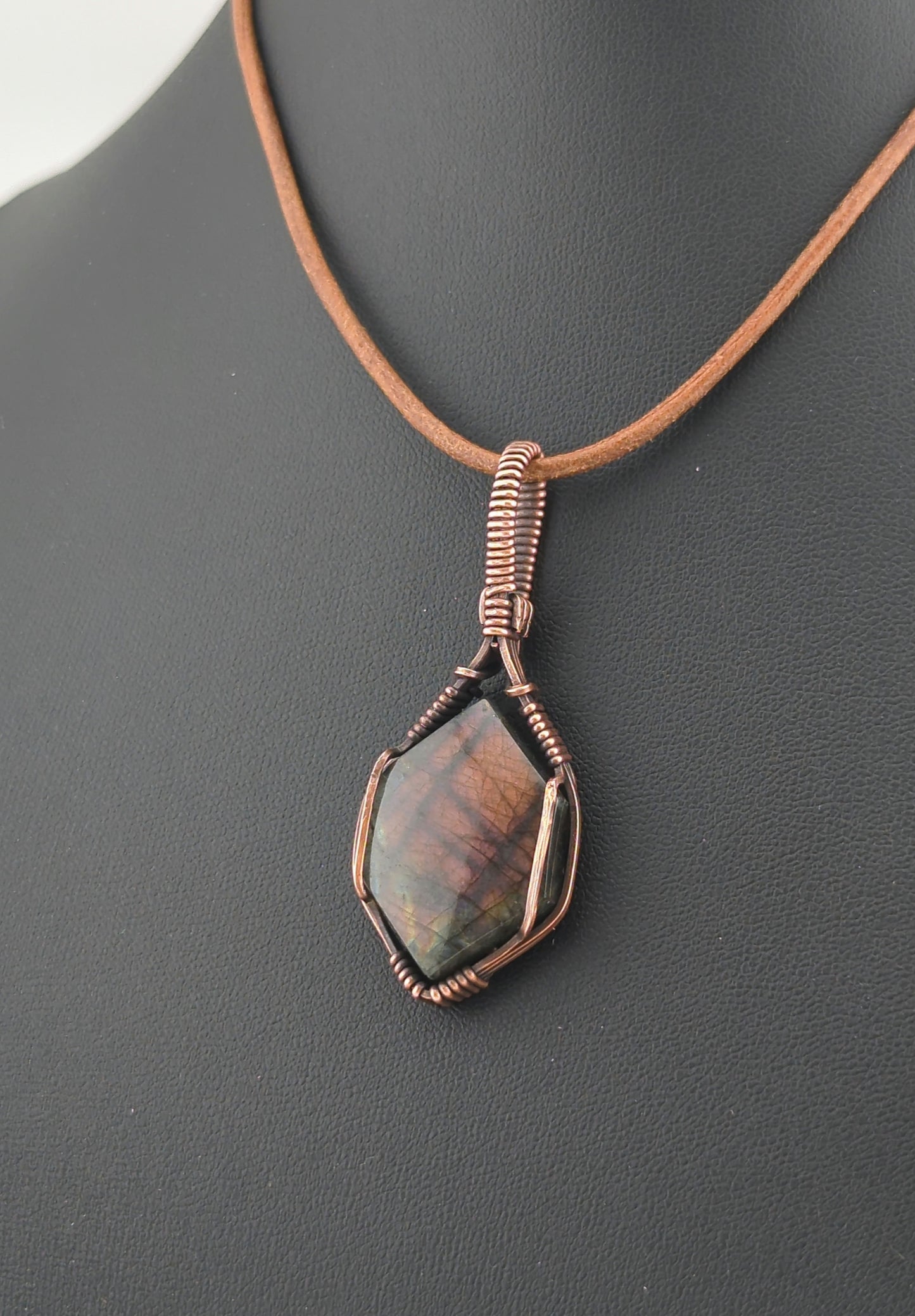 Labradorite Pendant, with rare purple flash, set in antiqued copper.