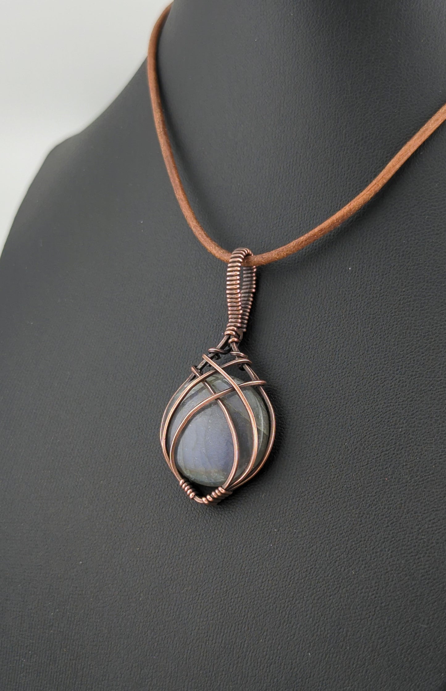 Labradorite Pendant, with rare purple flash, set in antiqued copper.