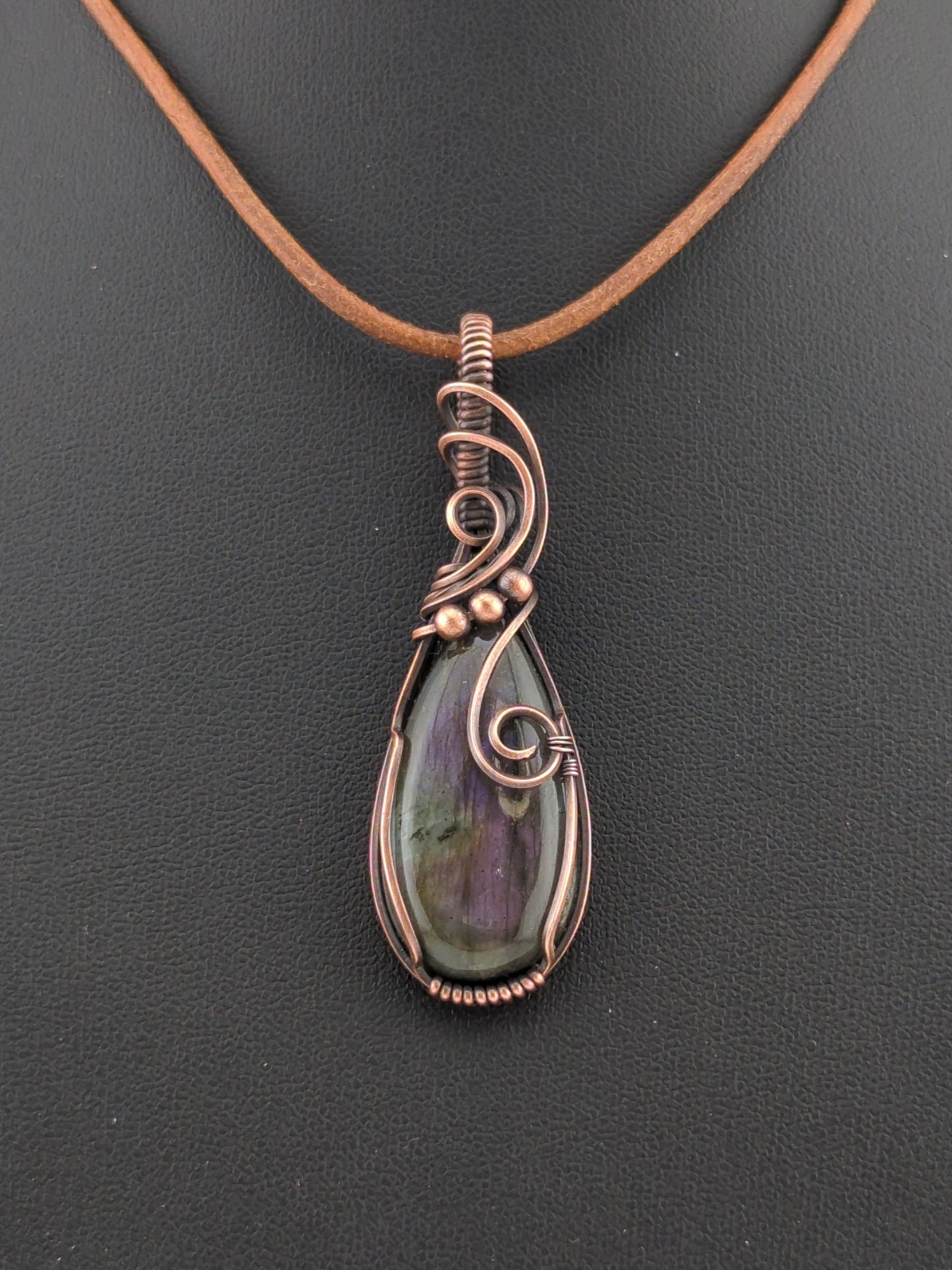 Labradorite pendant with  purple flash, set in antiqued copper.