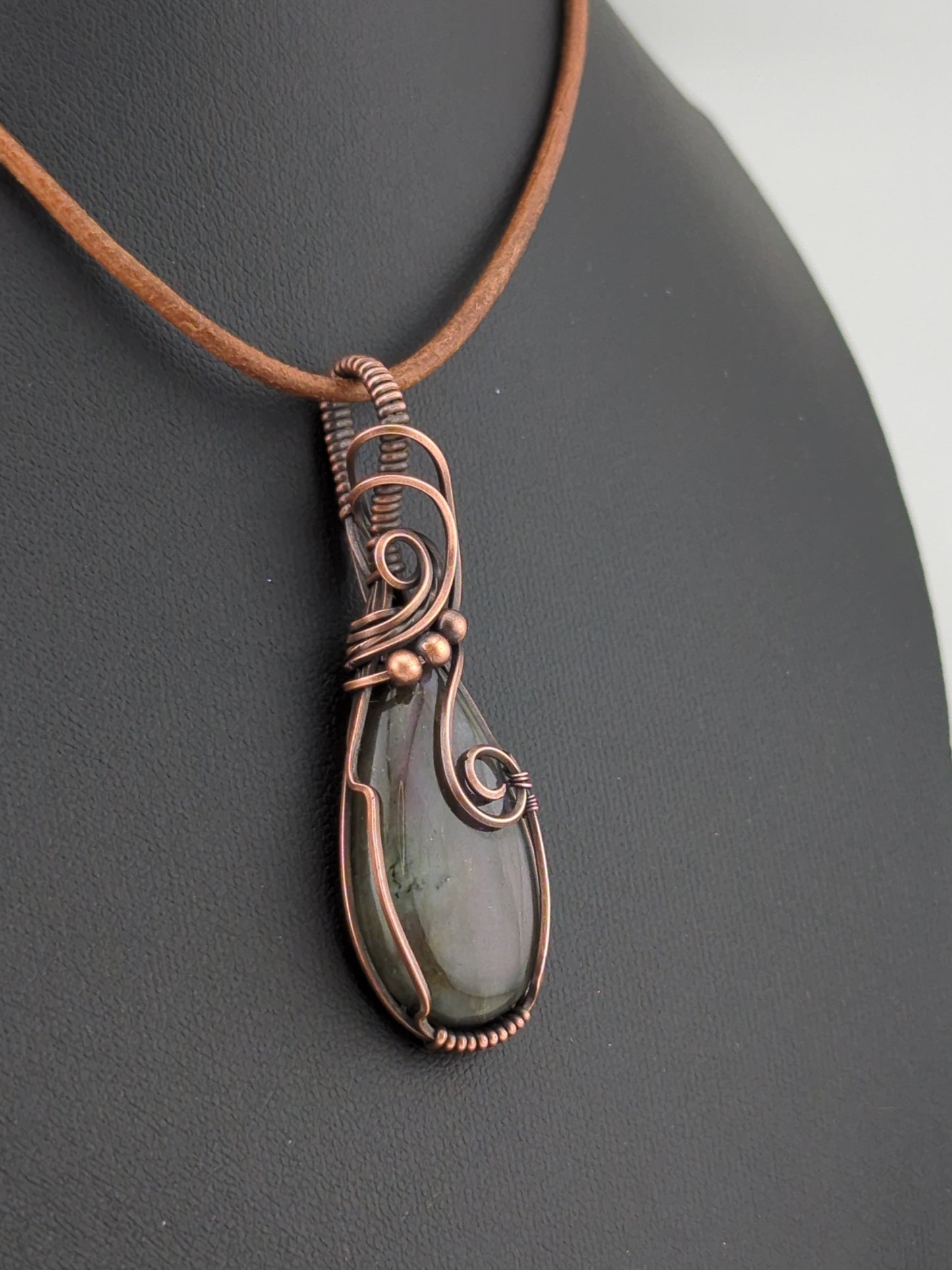 Labradorite pendant with  purple flash, set in antiqued copper.