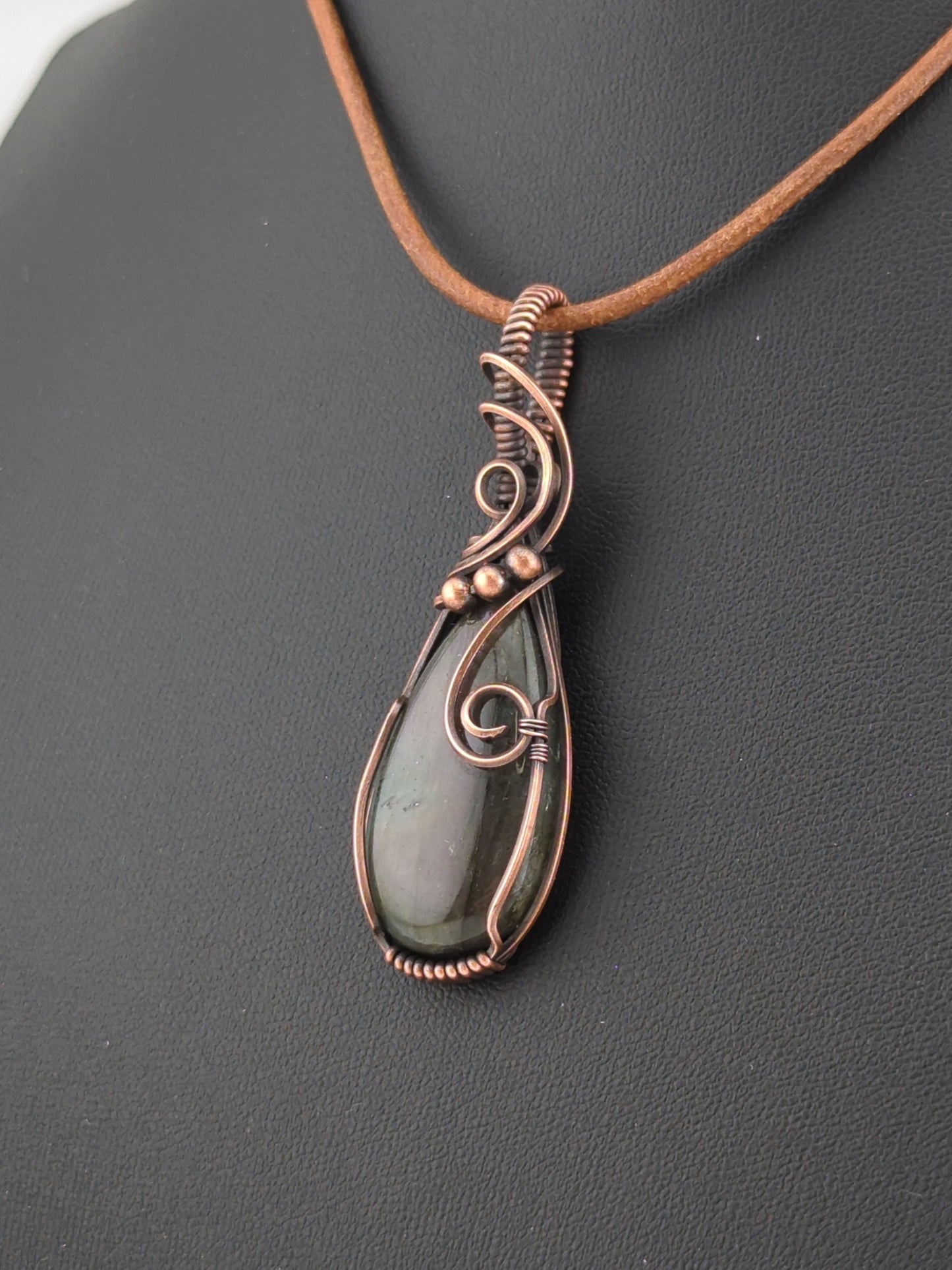 Labradorite pendant with  purple flash, set in antiqued copper.