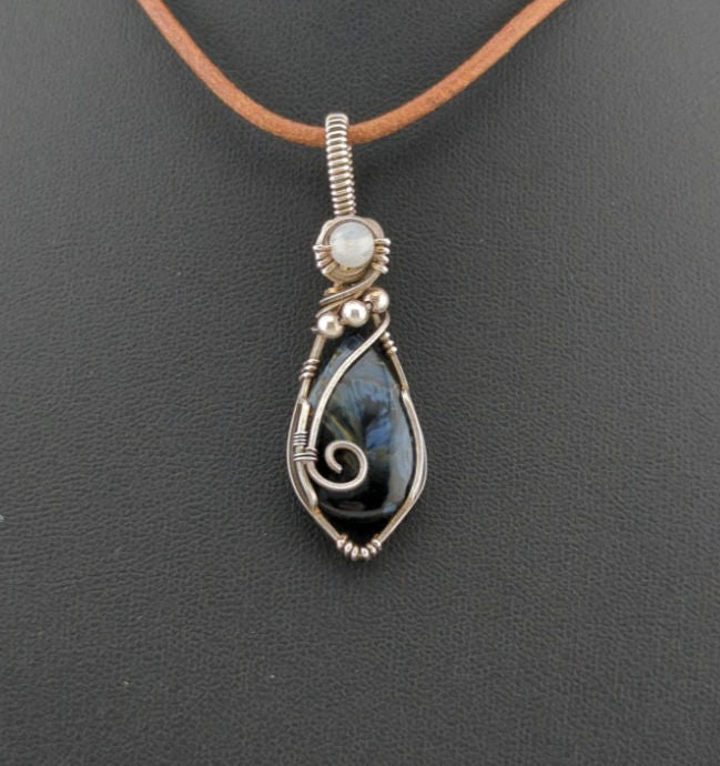 Pietersite Pendant, set in Sterling Silver, accented with Moonstone.