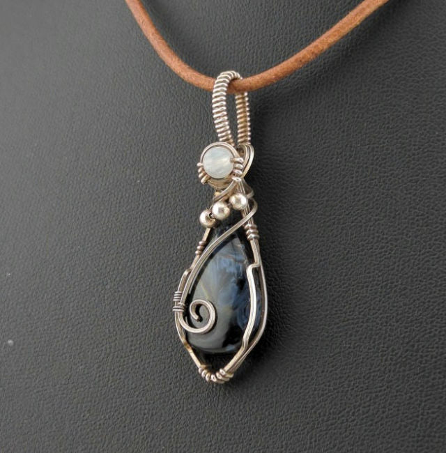 Pietersite Pendant, set in Sterling Silver, accented with Moonstone.