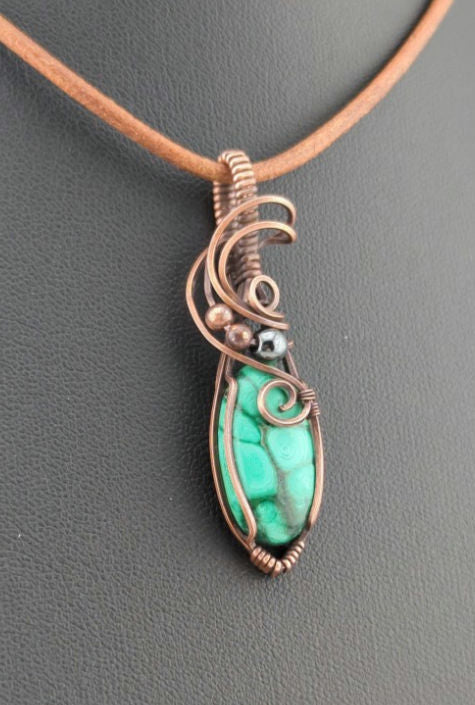 Malachite Gemstone Pendant, set in antiqued copper, accented with Hematite.