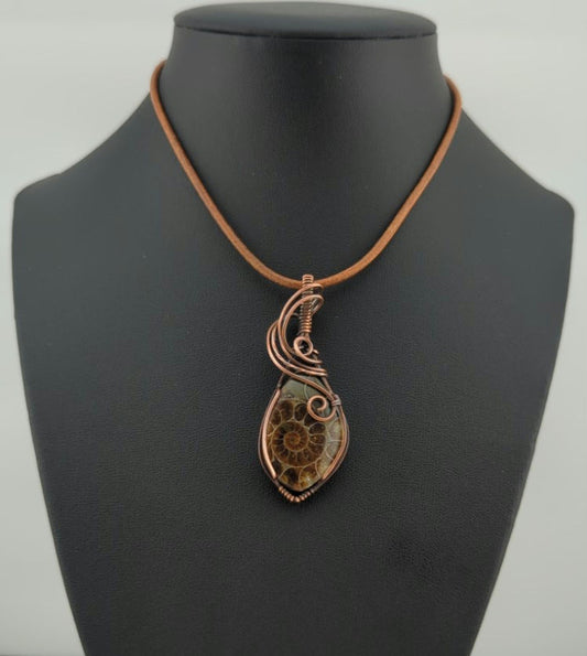 Ammonite pendant, set in antiqued copper.