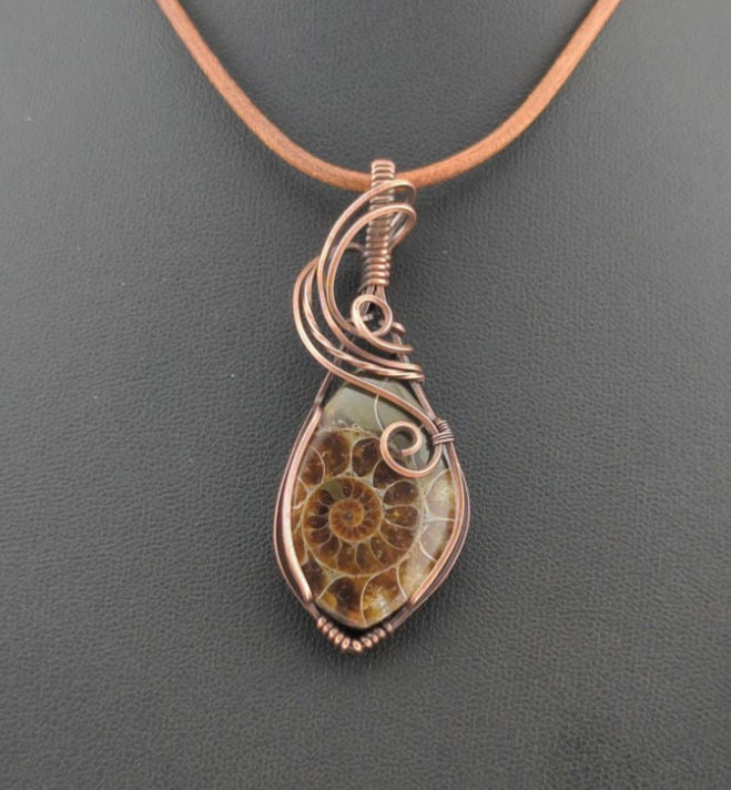 Ammonite pendant, set in antiqued copper.