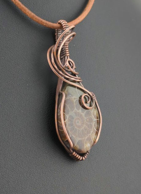 Ammonite pendant, set in antiqued copper.