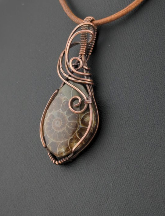 Ammonite pendant, set in antiqued copper.