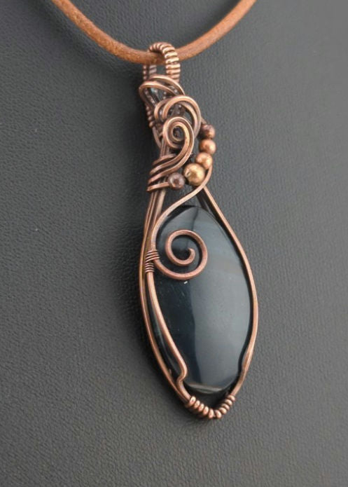 Blue Tiger Eye Pendant, Set in antiqued copper.