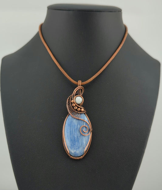 Kyanite, set in antiqued copper, accented with Moonstone.