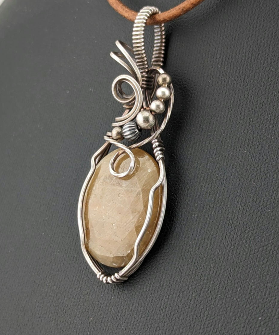 Golden Sapphire Pendant, set in Sterling silver