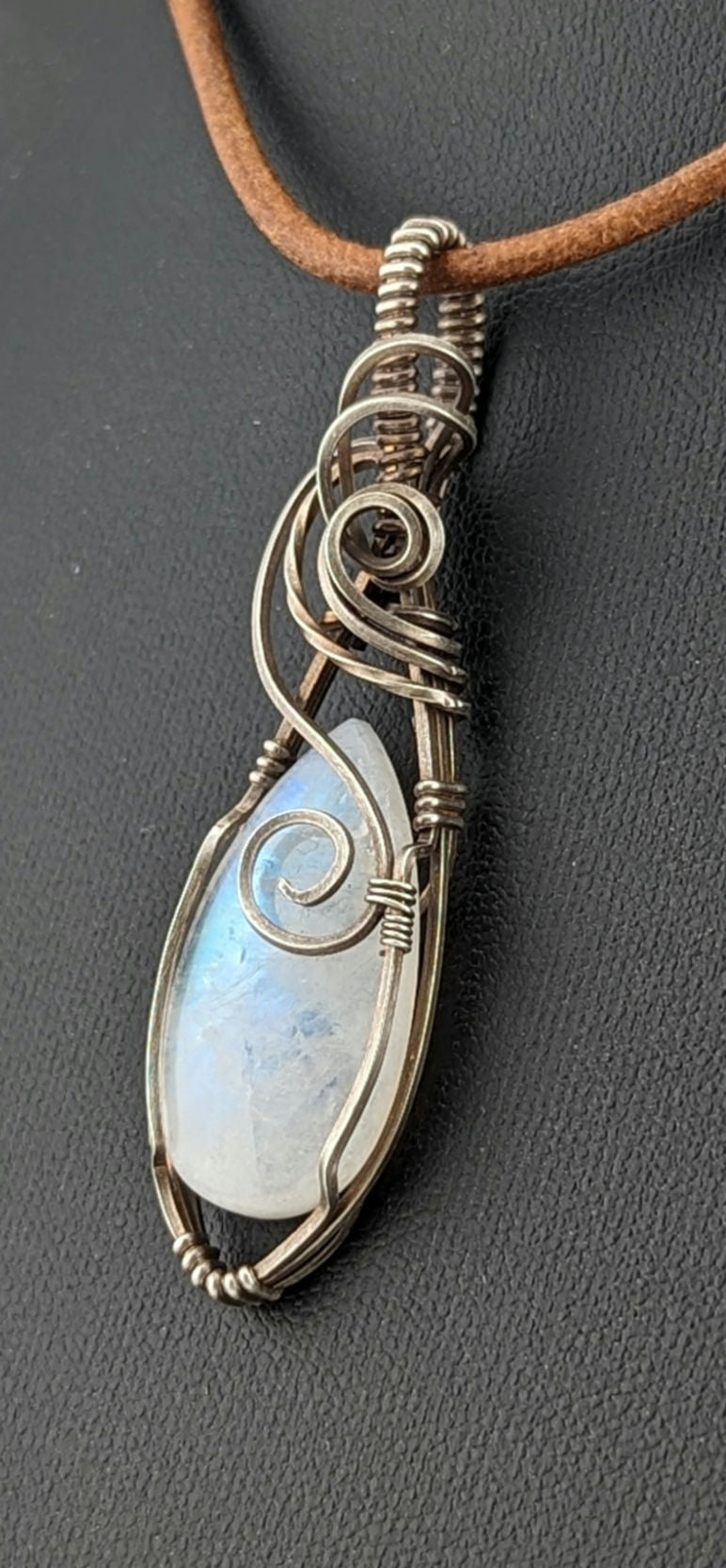 Moonstone pendant, with blue flash set in Sterling Silver.