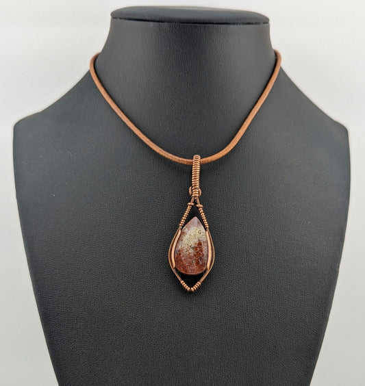 Indonesian Plume Agate Pendant, set in antiqued copper.