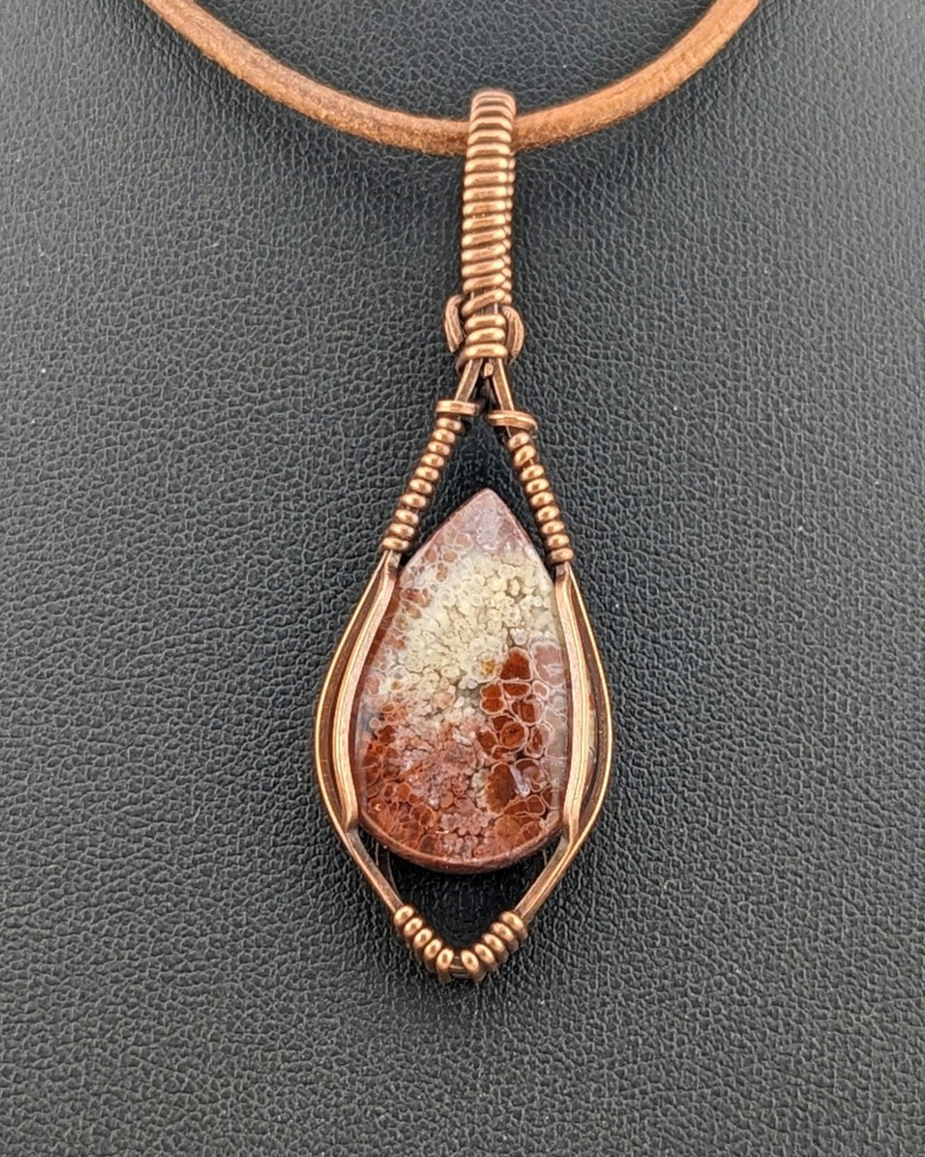 Indonesian Plume Agate Pendant, set in antiqued copper.