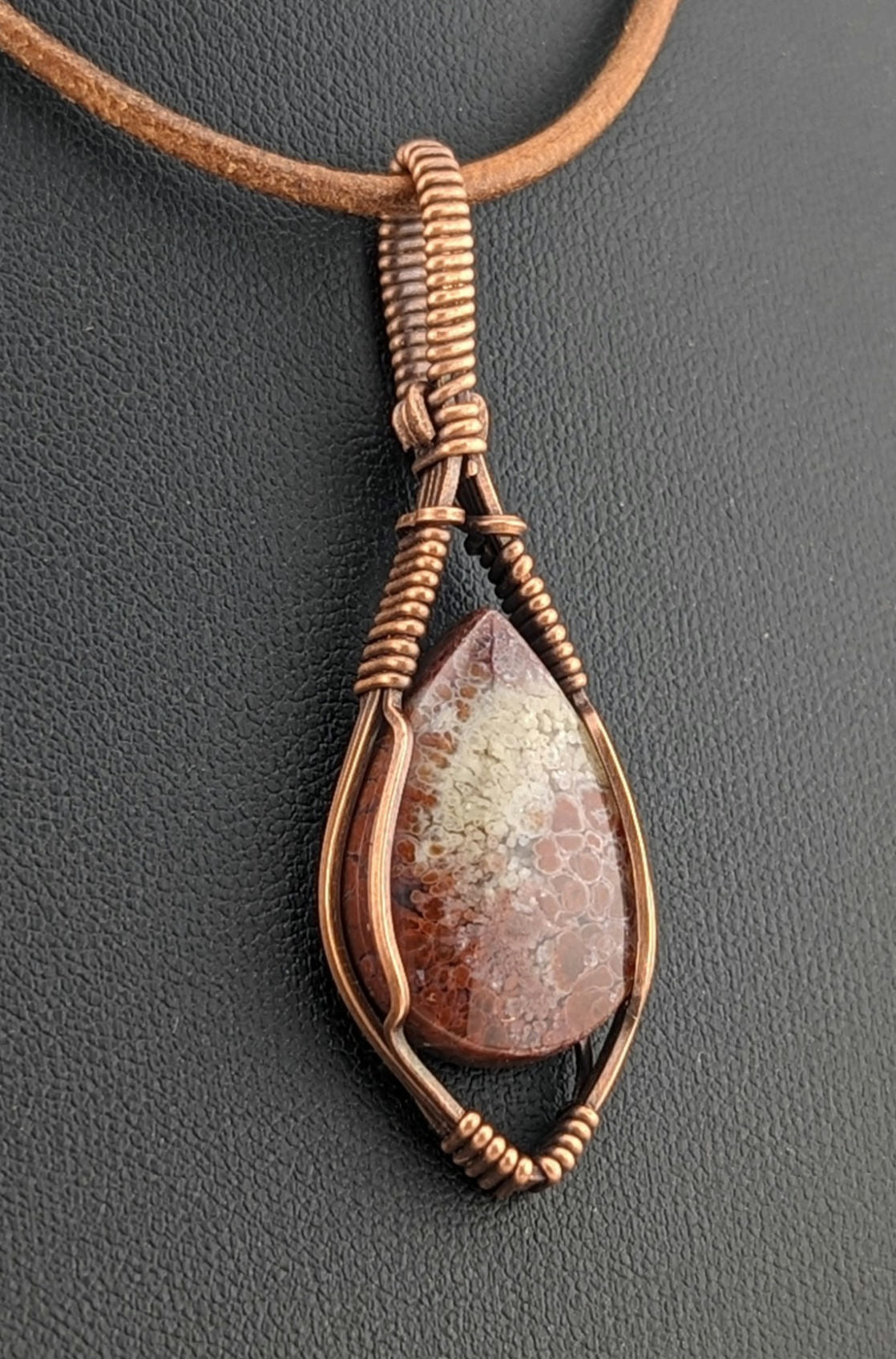 Indonesian Plume Agate Pendant, set in antiqued copper.