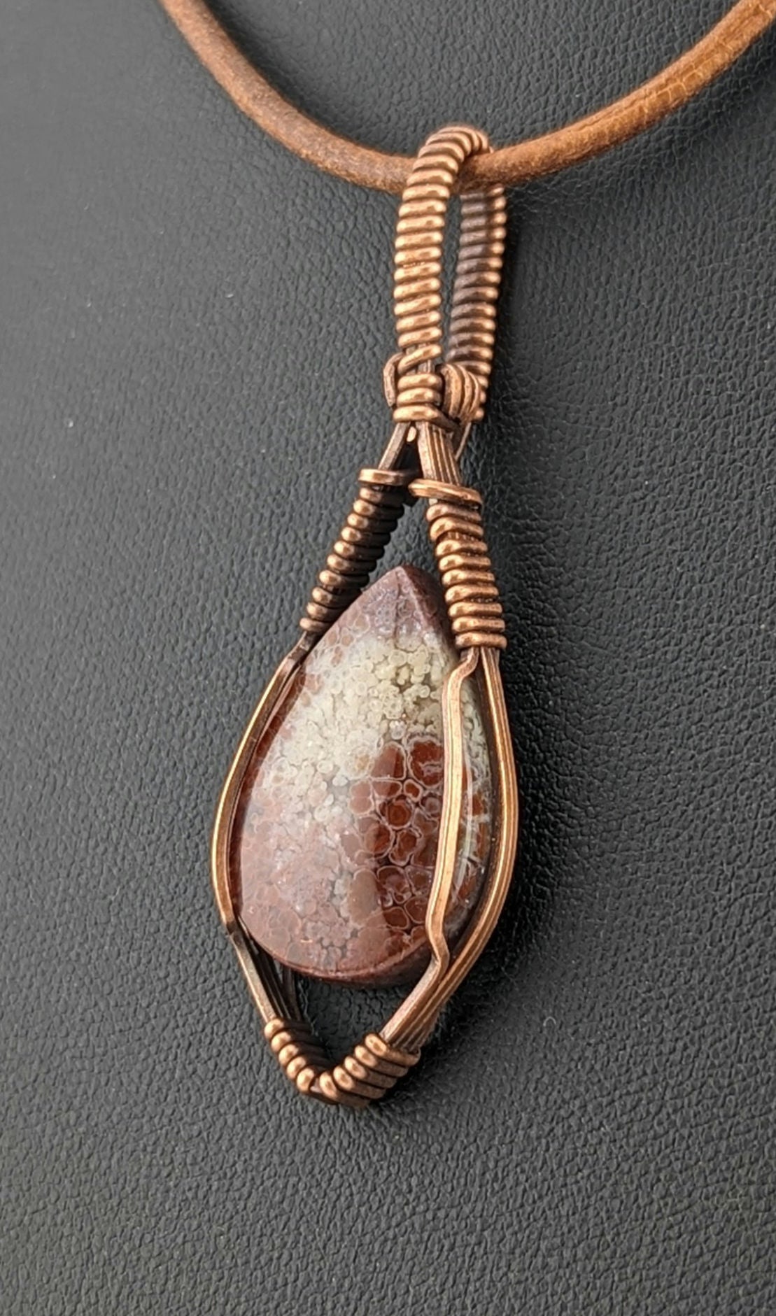 Indonesian Plume Agate Pendant, set in antiqued copper.