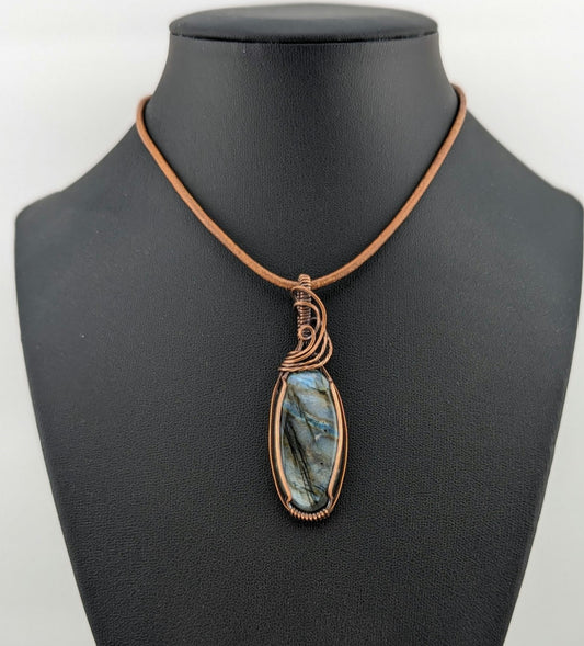 Labradorite gemstone pendant with Blue and Silver flash, set in antiqued copper.