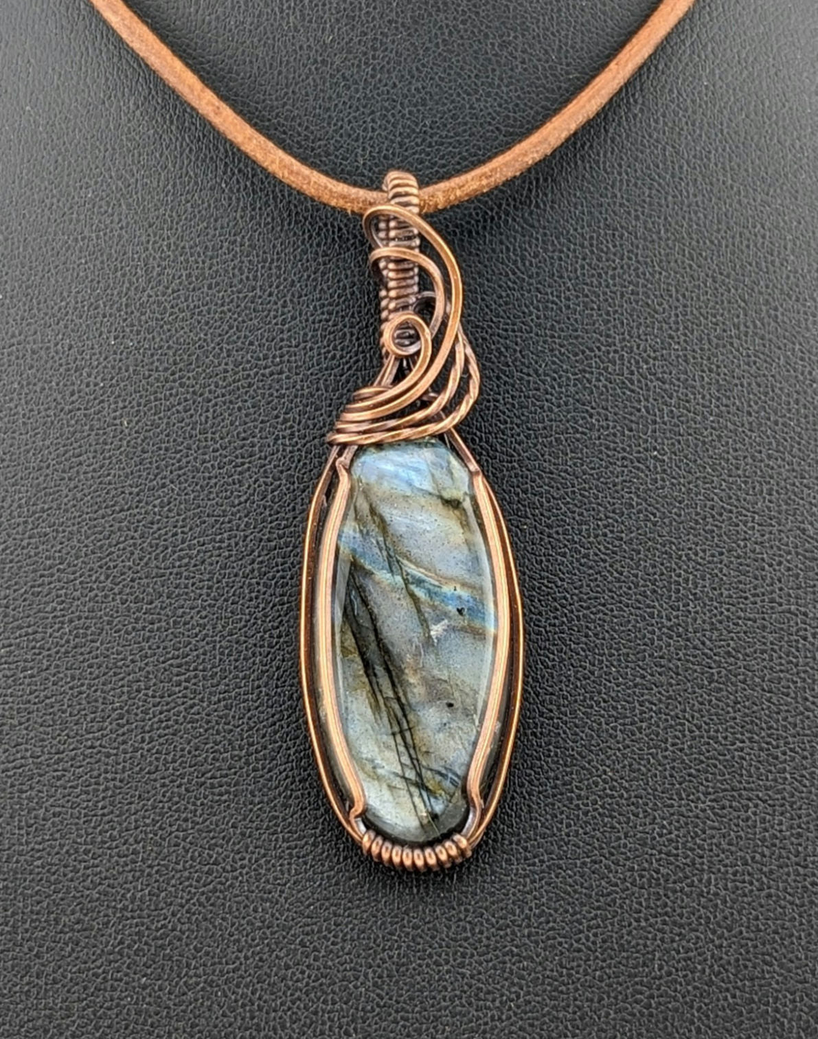 Labradorite gemstone pendant with Blue and Silver flash, set in antiqued copper.