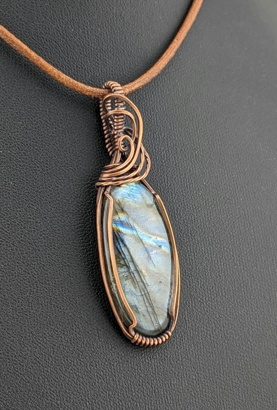 Labradorite gemstone pendant with Blue and Silver flash, set in antiqued copper.