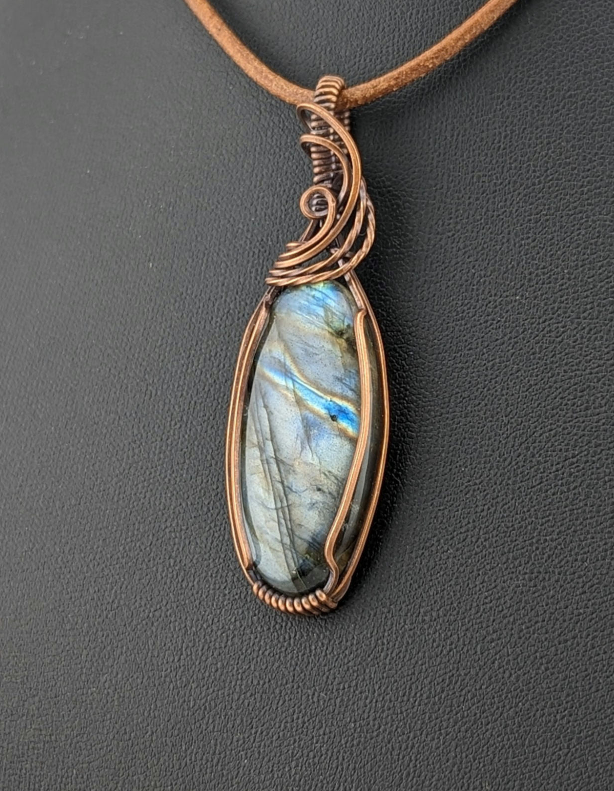 Labradorite gemstone pendant with Blue and Silver flash, set in antiqued copper.