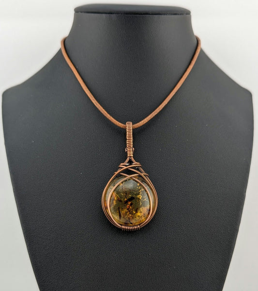 Amber Pendant with set in antiqued copper.