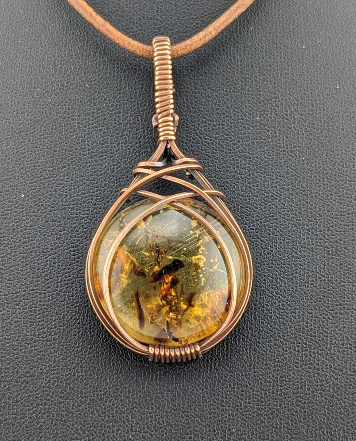 Amber Pendant with set in antiqued copper.