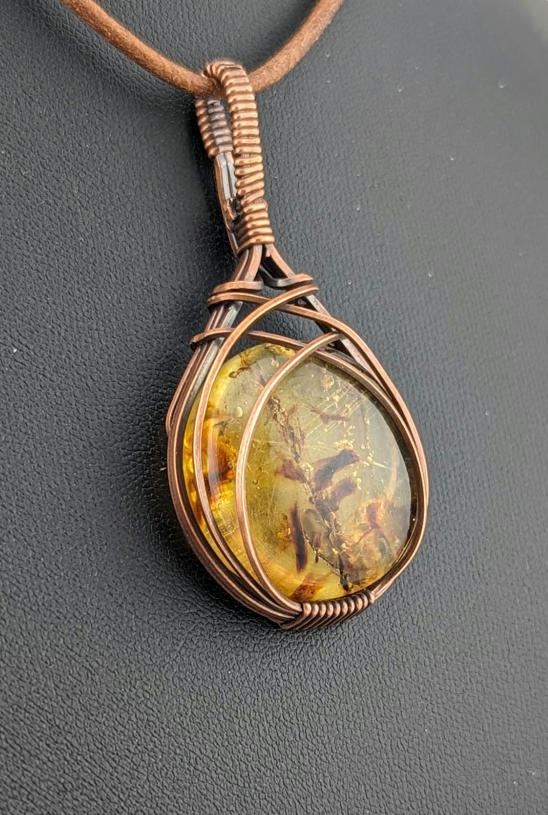 Amber Pendant with set in antiqued copper.