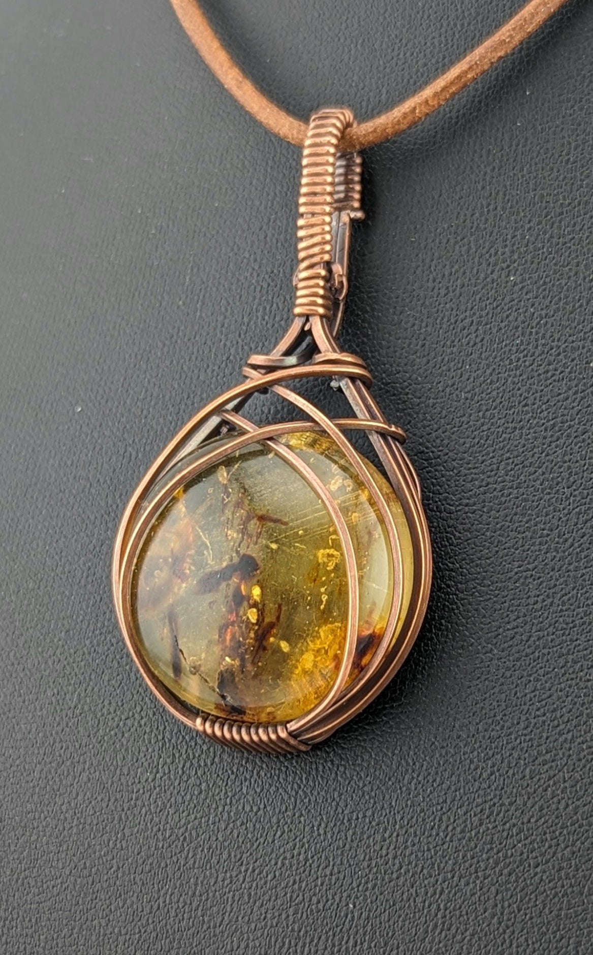 Amber Pendant with set in antiqued copper.