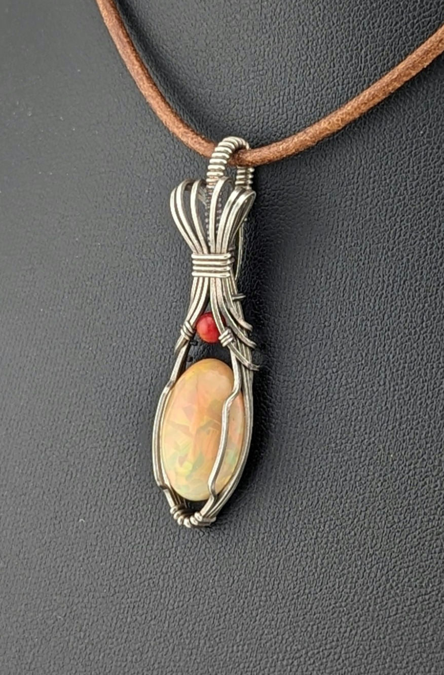 Ethiopian Opal Gemstone Pendant, accented with Carnelian and set in Sterling Silver