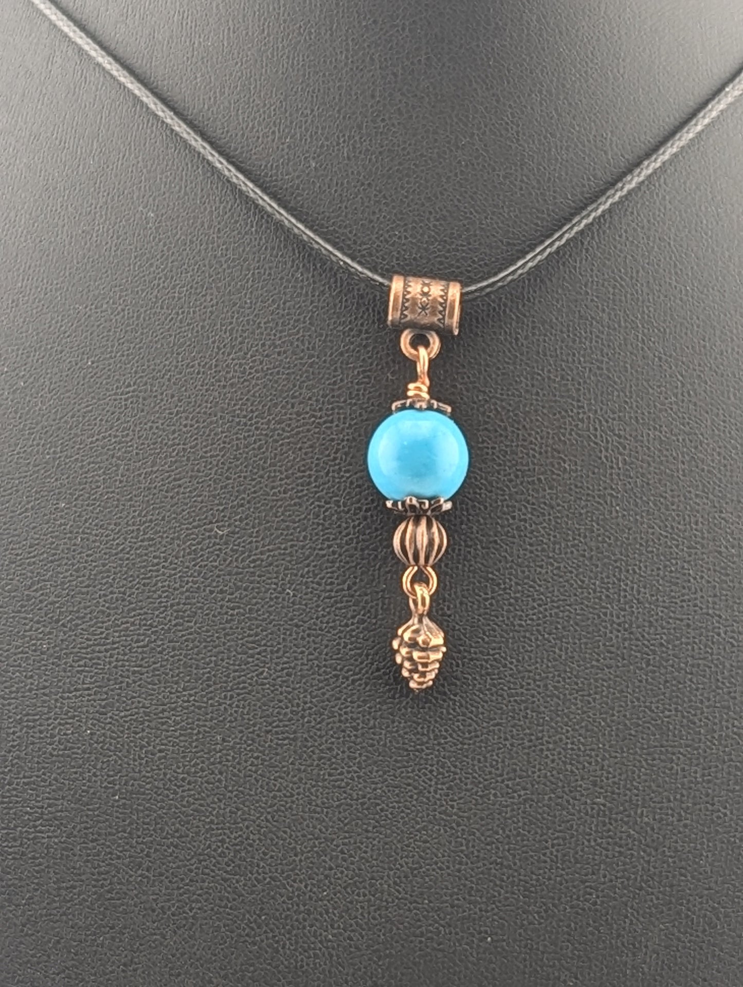 Turquoise pendant with Pine Cone, in antiqued copper finish