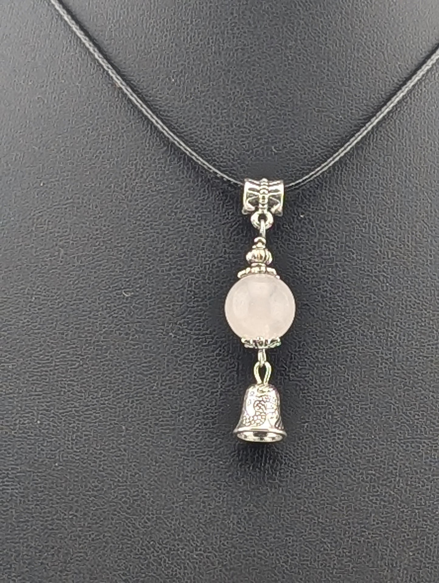 Rose Quartz pendant with Bell, in antiqued Silver finish