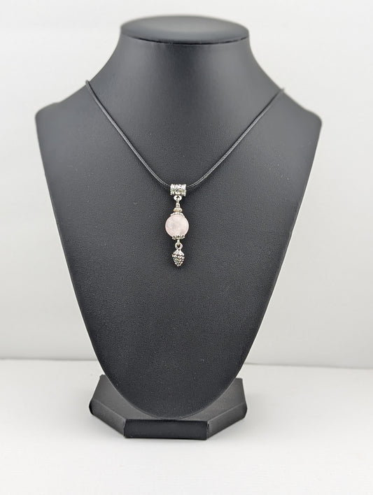 Rose Quartz pendant with a pine cone in antiqued Silver finish