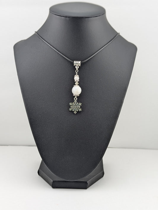 Moonstone pendant with a Snowflake charm in antiqued Silver finish