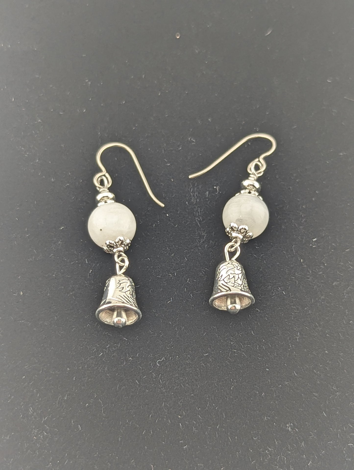 Moonstone earrings with a Bell charm in antiqued Silver finish