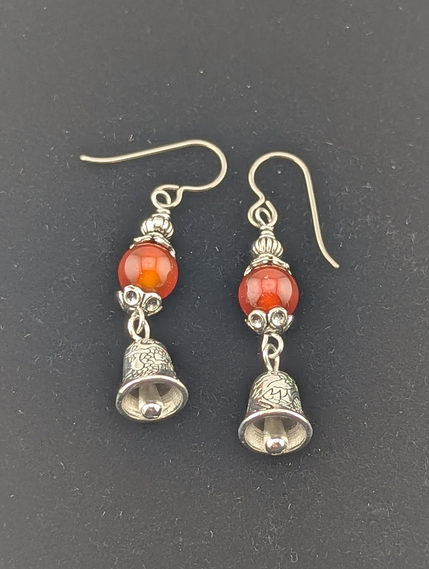 Carnelian earrings with a Bell charm in antiqued Silver finish