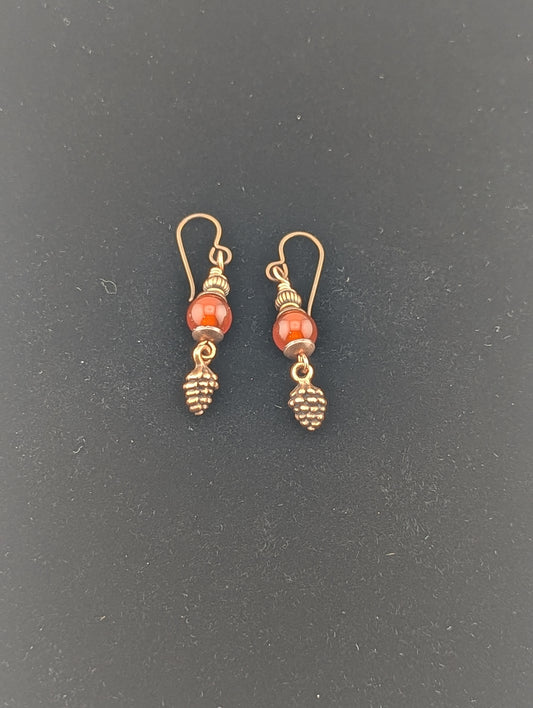 Carnelian earrings with a Pine Cone charm in antiqued Copper finish