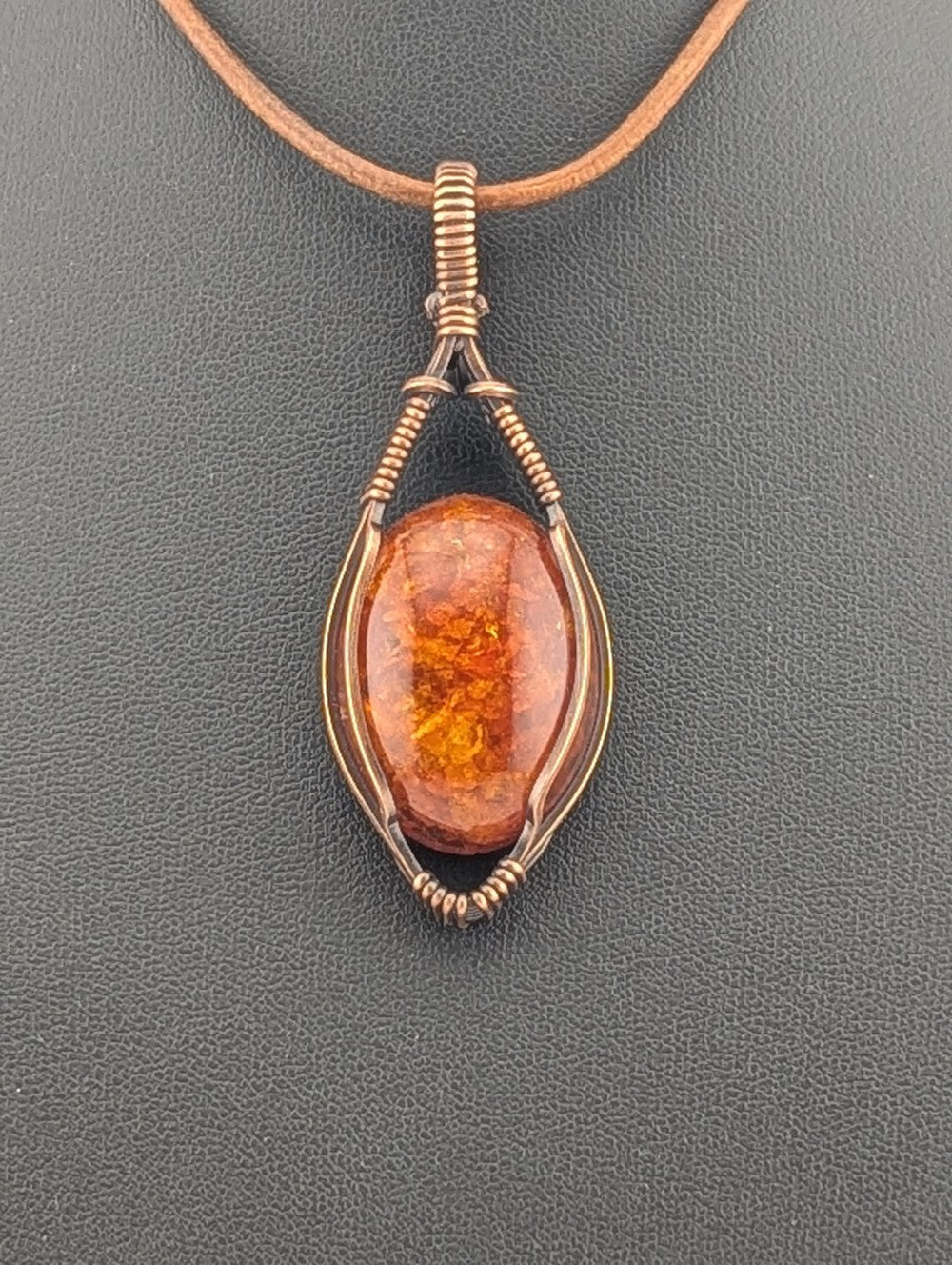 Amber Pendant set in antiqued copper.