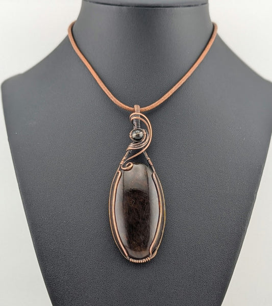 Amber Pendant, accented with Smokey Quartz and set in antiqued copper.