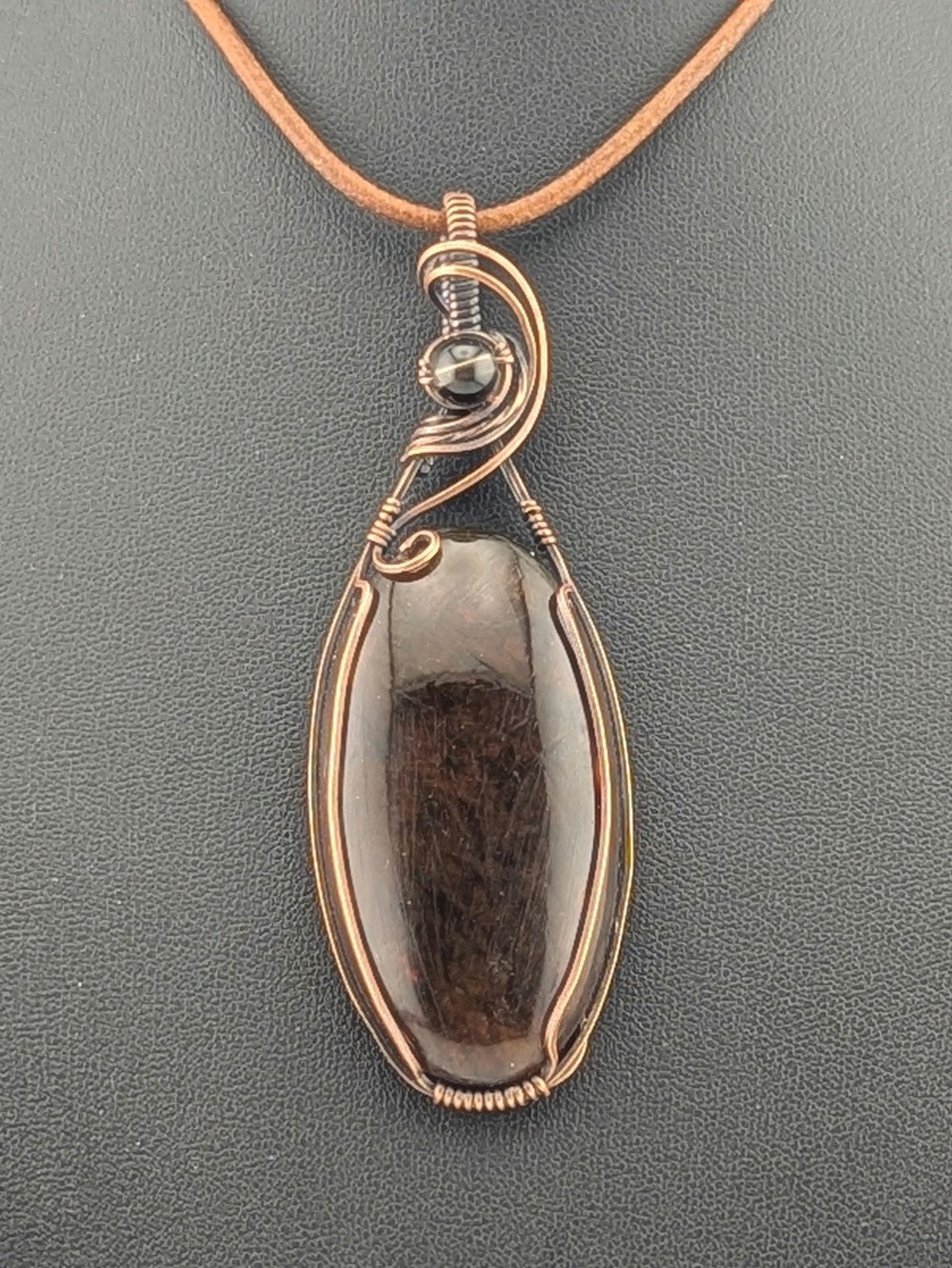 Amber Pendant, accented with Smokey Quartz and set in antiqued copper.