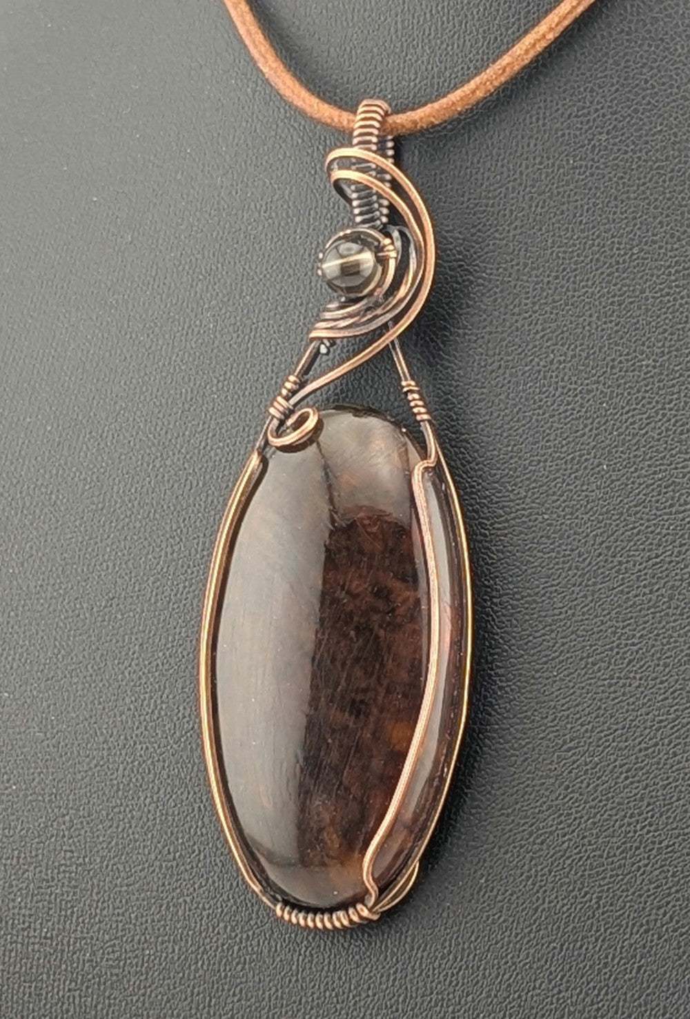 Amber Pendant, accented with Smokey Quartz and set in antiqued copper.