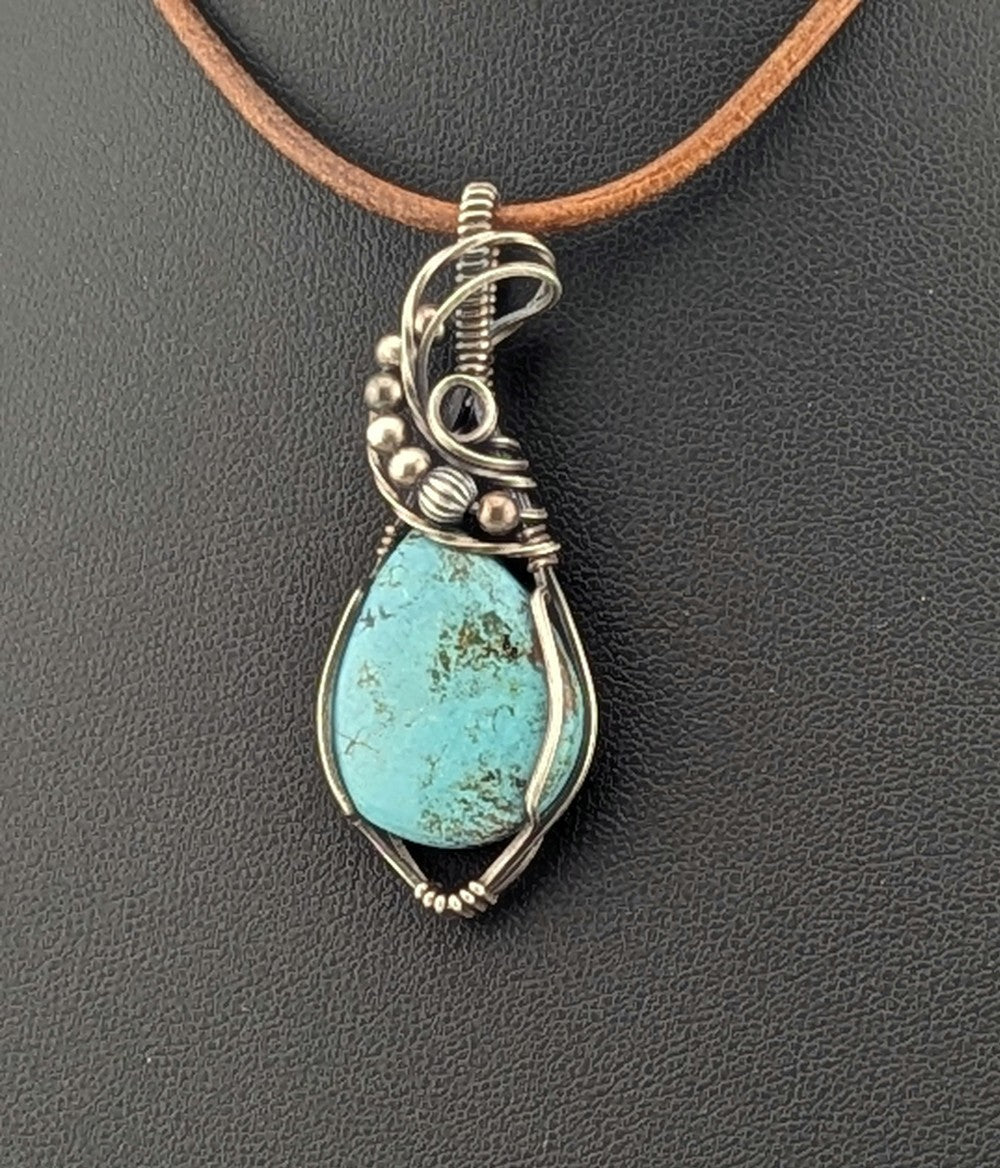 Kingman Turquoise pendant, set in antiqued Silver.