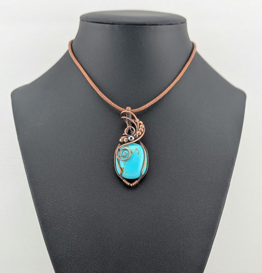 Turquoise pendant, set in antiqued copper