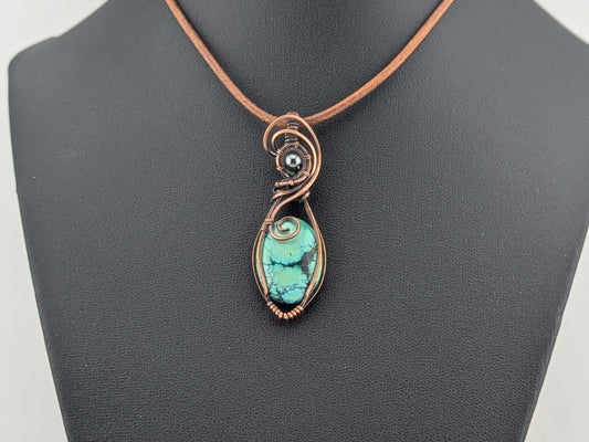 Variscite pendant, accented with hematite and set in antiqued copper.