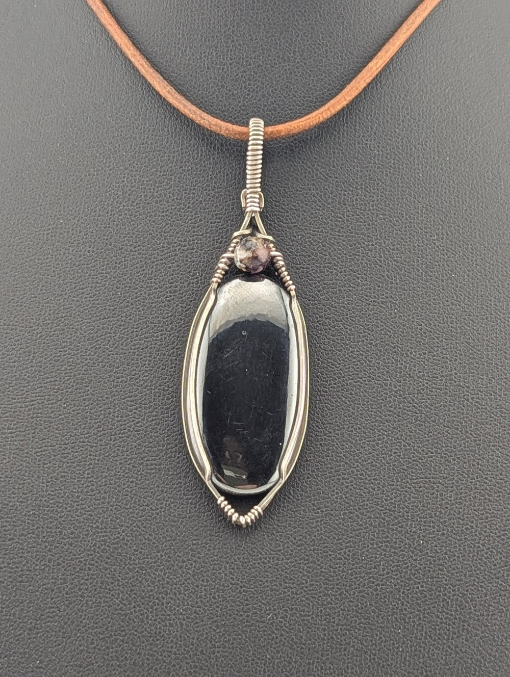 Hematite Gemstone Pendant, set in antiqued silver.