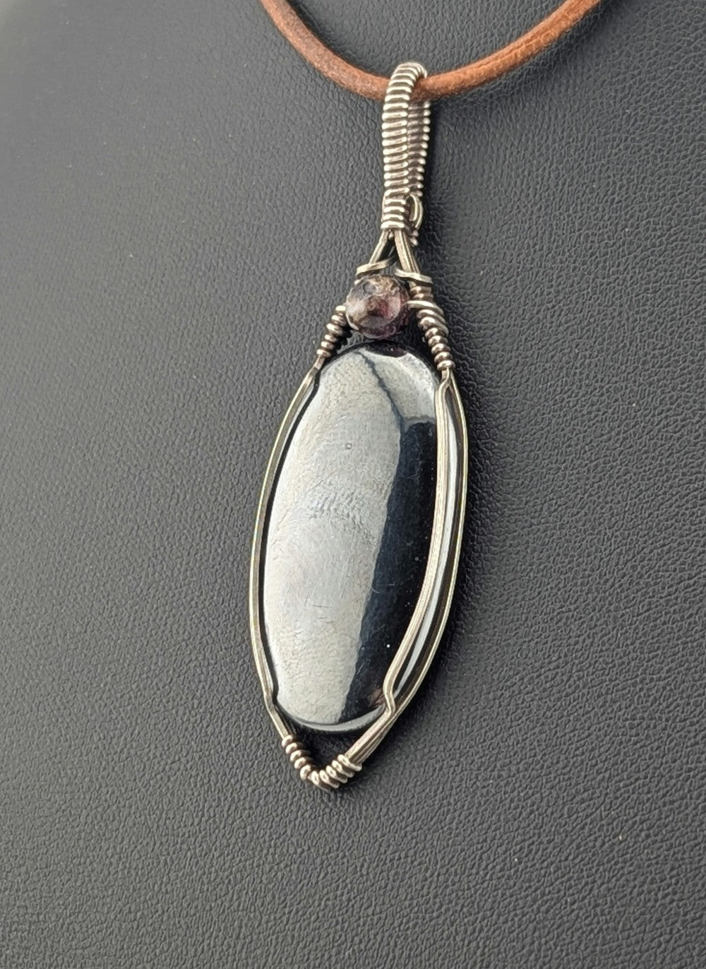 Hematite Gemstone Pendant, set in antiqued silver.