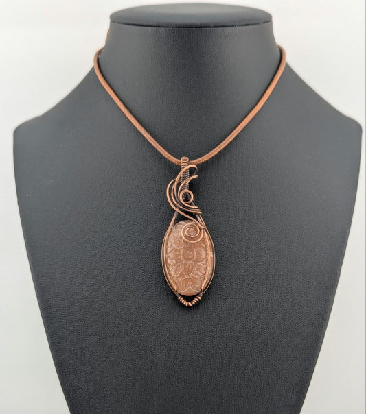 Peach Moonstone pendant,  set in antiqued copper.