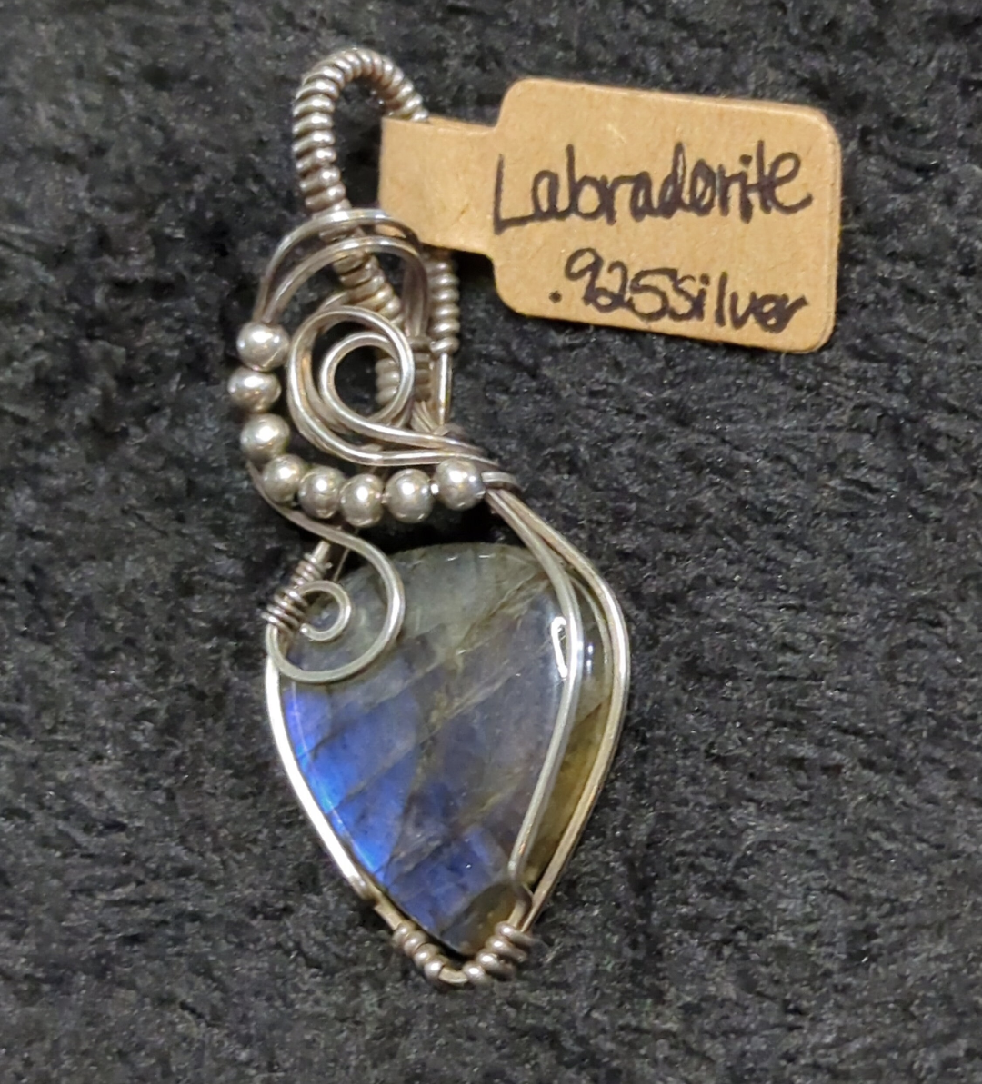 Labradorite pendant with blue flash, set in antiqued Sterling Silver.