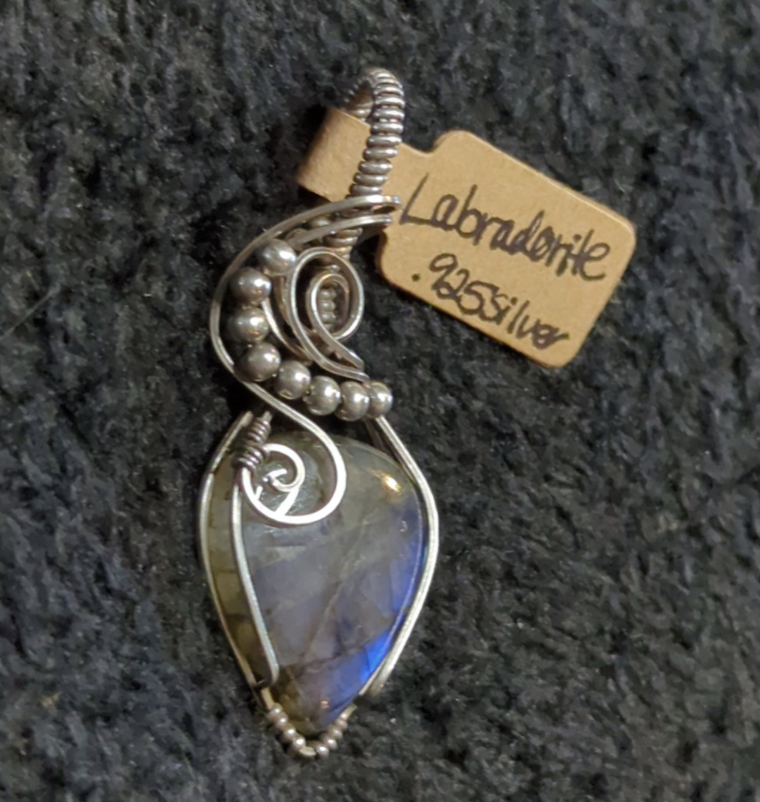 Labradorite pendant with blue flash, set in antiqued Sterling Silver.