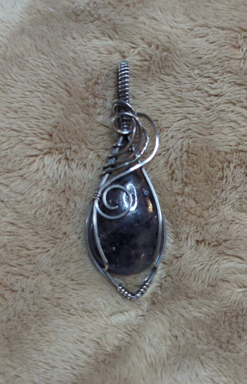 Iolite sunstone pendant, set in Sterling Silver.